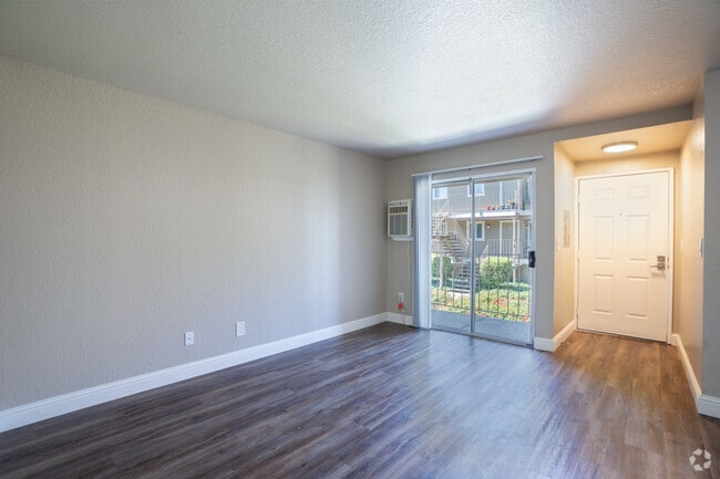 1BR, 1BA - 649SF with White Cabinets - Living Room