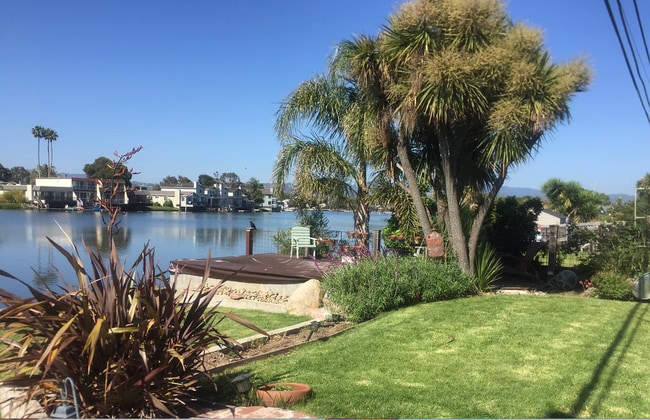 Photo - Rare prime waterfront home right on the San Mateo Lagoon, available August 15th!