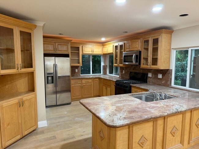 Photo - Large pool home with lots of space and gue...