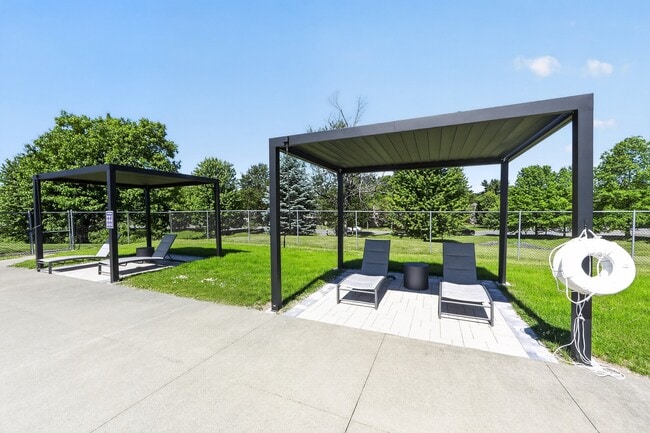 Find your perfect retreat at Lake Shore Park Apartments. Enjoy the serene outdoor lounges, perfect for relaxation or social gatherings surrounded by lush greenery. Discover your ideal lifestyle today—schedule a visit!