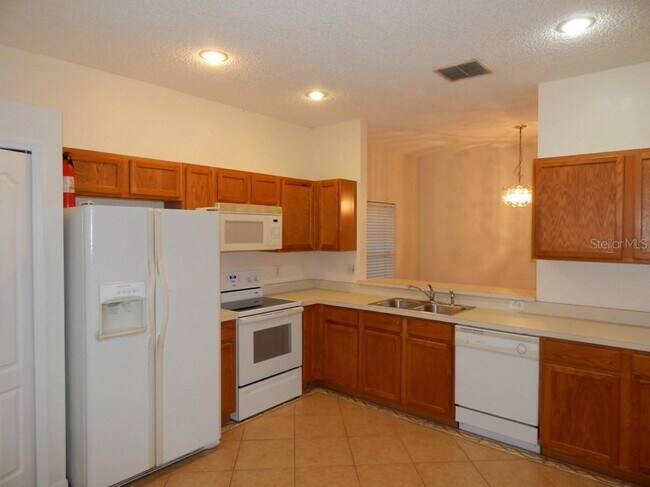 Photo - **Charming 4BR/2BA Pond-View Home with Boat Ramp Access – East Orlando **