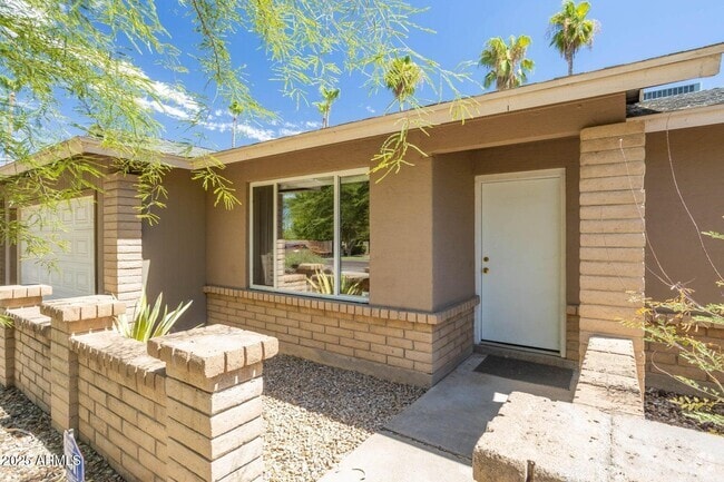 Building Photo - 4077 E Cholla St Rental
