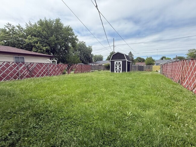 Photo - Newly rehab, three bedroom, one bath and Christian Park with a fence yard.