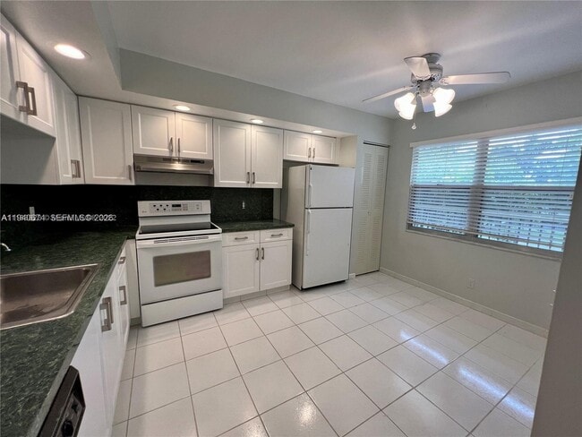 Photo - 1201 SW 128th Terrace Unit 310E