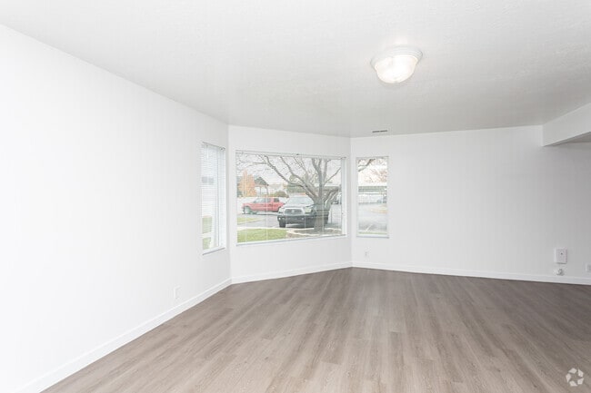 3BR, 2BA - 1,500SF - Living Room - Stonebridge Apartments