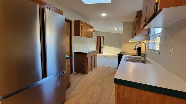 Photo - Huge 4 bedroom 2 bath home in a great family neighborhood.