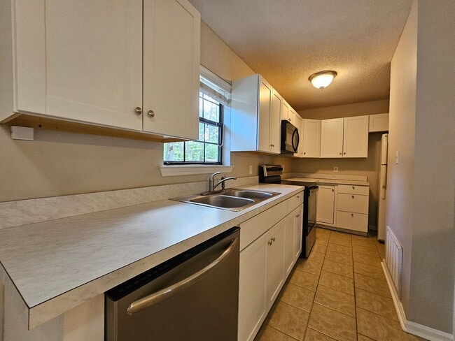 Photo - **Newly remodeled kitchen ** 2 bedroom, 2bath Isle of Hope home with fenced in backyard and scre...