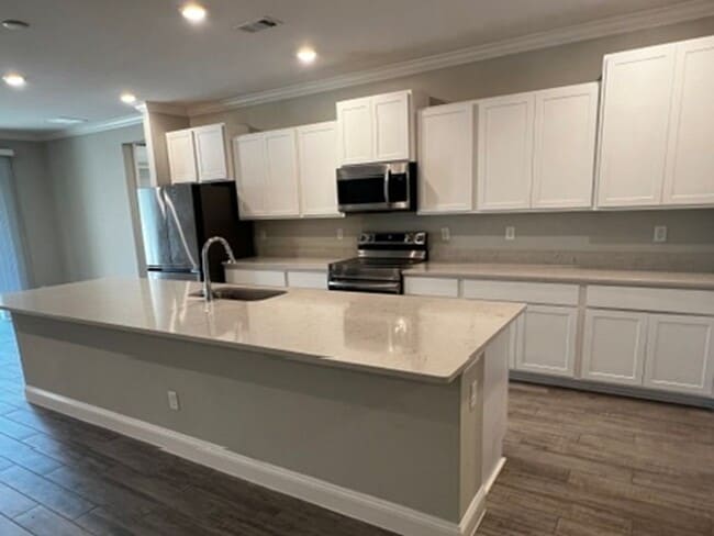 Photo - FOUR BEDROOMS and THREE BATHS For Rent