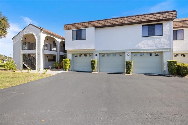 Building Photo - 822 Capri Isles Blvd Unit 107