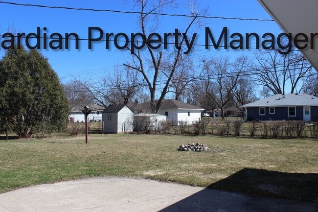 Photo - Single Family Home Featuring 2 Baths, 2 Car Garage, Fireplace, and Fenced in Yard