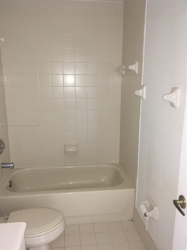 Building Photo - 7100 NW 177th St Unit 202-14