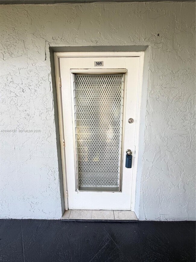 Photo - 9201 Lime Bay Blvd Unit 305