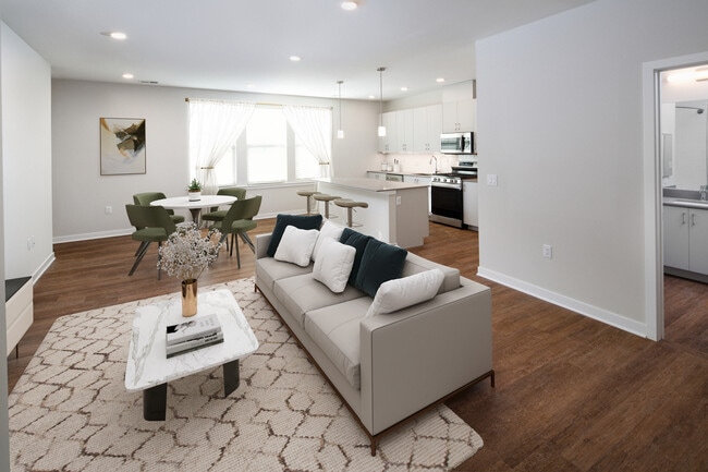 Design Collection I (North Building) Kitchen, living, and dining areas with hard surface flooring throughout