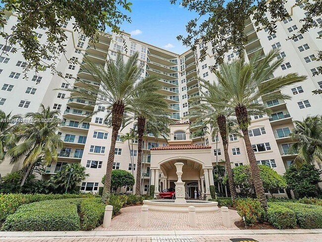 Building Photo - 19900 E Country Club Dr Unit 318