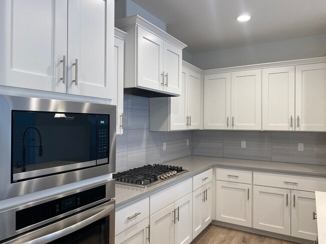 Photo - NEWER CONSTRUCTION! Beautiful Brand Home Backs to Greenspace! Gourmet Kitchen, Open Landing, Fenc...