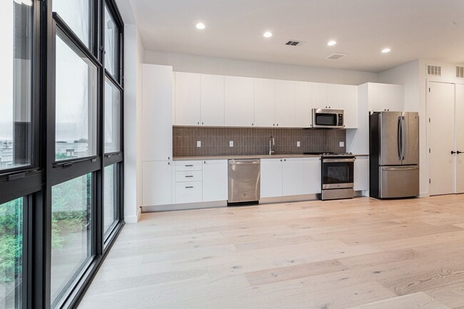 Photo - Light-Filled 2 Bed / 1 Bath – Wide-Plank Hardwood & W/D Included