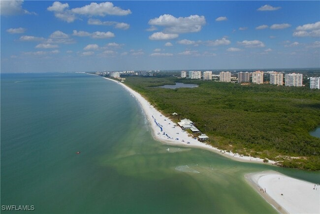 Building Photo - 6361 Pelican Bay Blvd Unit 305 Rental