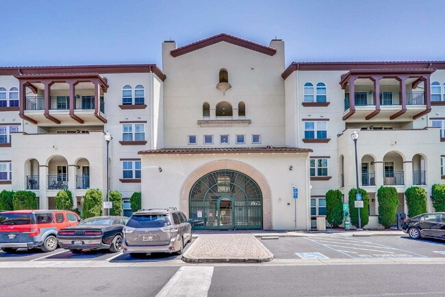 Building Photo - Spacious 3 Bed, 2 Bath with 2 Private Garages, Extra Storage & Resort Style Amenities Unit 100