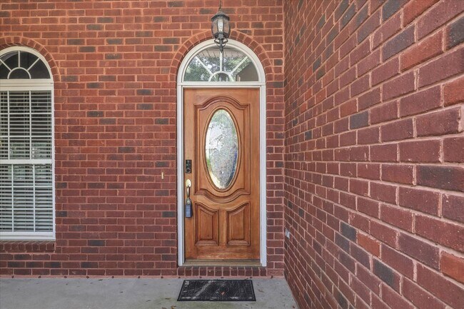 Photo - Stunning all-brick home on a large wooded lot