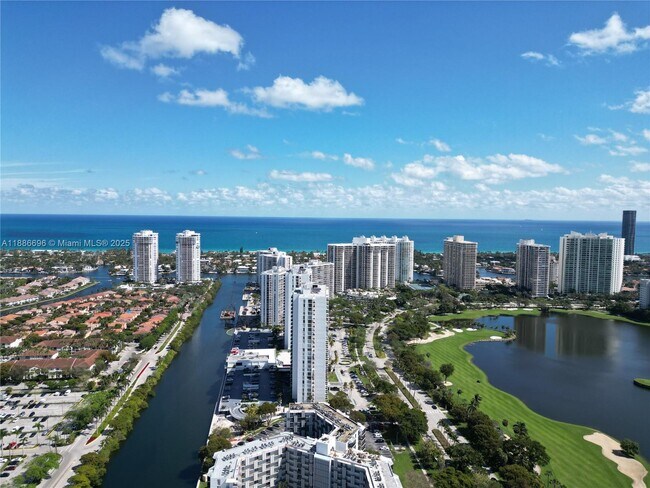 Building Photo - 3675 N Country Club Dr Unit 210