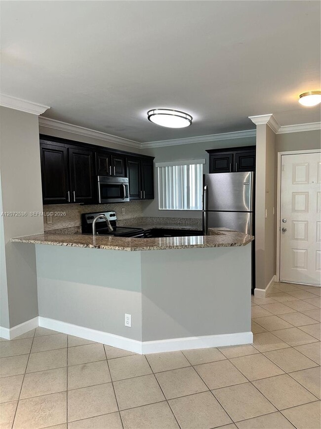 Photo - 8750 N Sherman Cir Unit 103