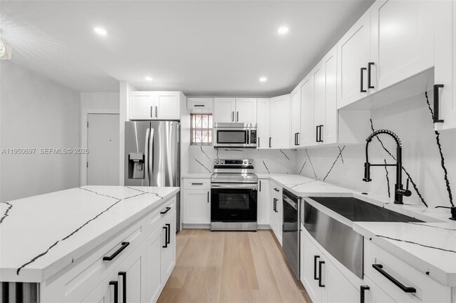 Building Photo - 1890 W 56th St Unit 1211