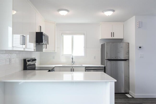 Building Photo - 6548-65175 175 Ave NW