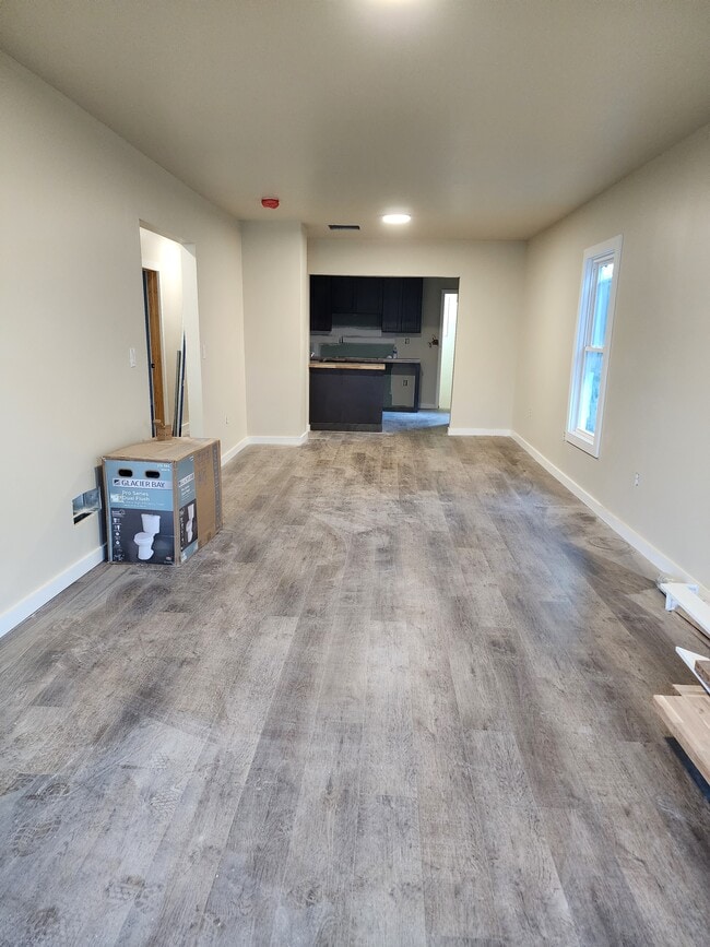 Living/dining areas facing the kitchen - 331 W Colvin St Unit #2