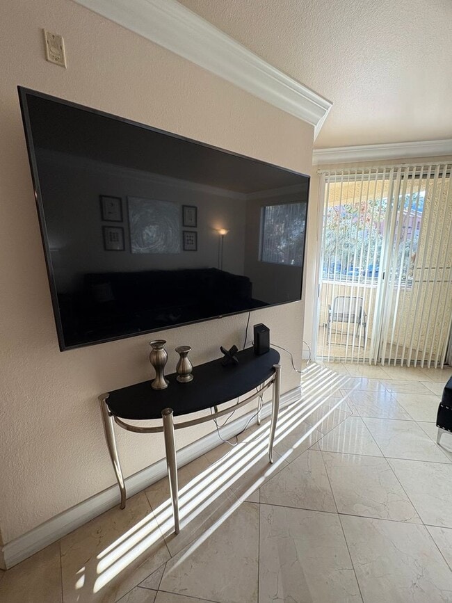 Photo - Long or short term available!  Live in luxury in this fully furnished 2 bedroom condo.