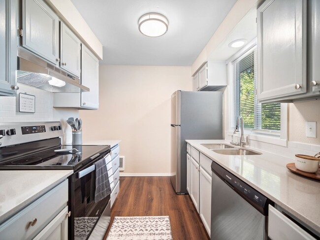 Photo - Clean and Cozy 2 bedroom condo with private parking