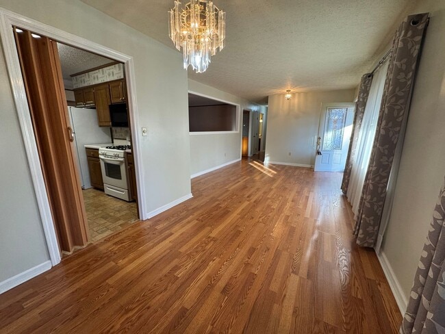 Photo - Spacious three bedroom, two bathroom with covered back porch and detached garage located on Cave ...