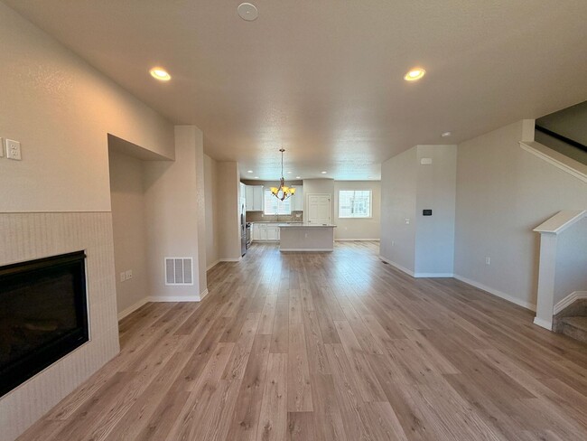 Photo - Move-In Ready 3-Story Townhome with Loft & 2-Car Garage