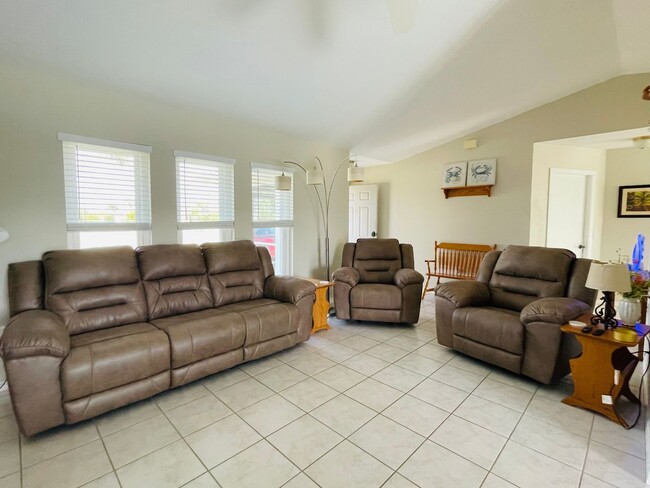 Photo - SOUTH GULF COVE-WATERFRONT POOL HOME!