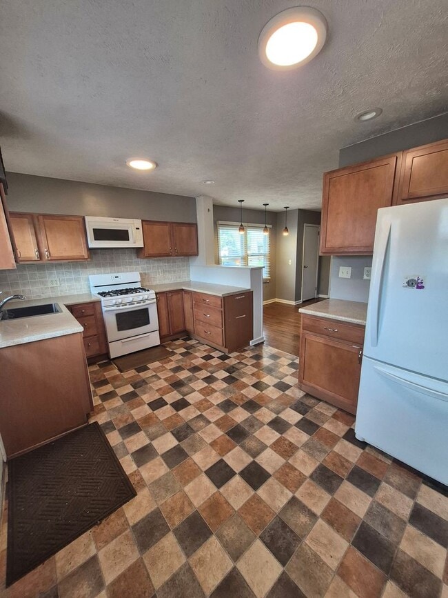 Photo - Charming 3 Bedroom, 2 Bath Home with Fenced Yard & Garage!