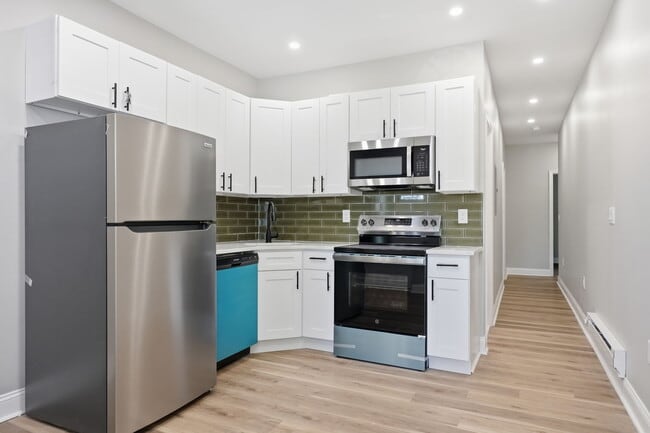 Building Photo - 6028 Osage Ave Unit 1