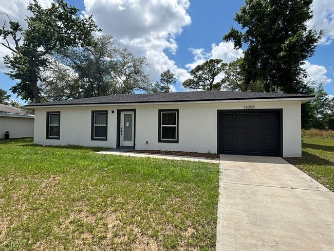 Building Photo - LIKE NEW DESIGNER HOME 3/2 READY FOR NEW FAMILY