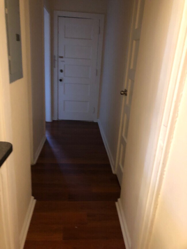 Hallway between Bath and Bedroom - 406 N Delaware St Unit 210
