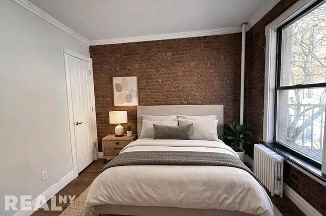 410 E 13th St Unit THREE