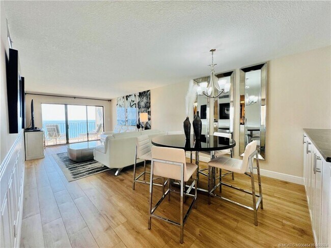 Building Photo - 10044 S Ocean Dr Unit 1005