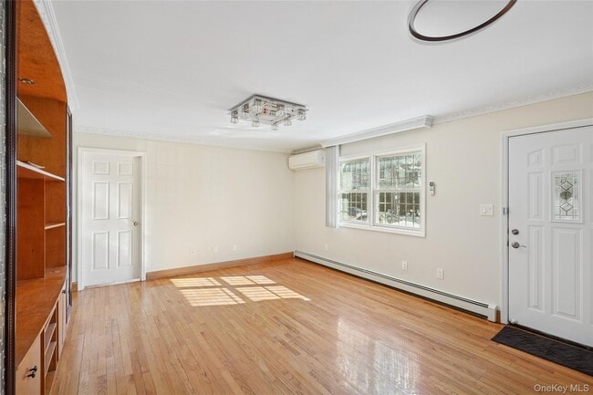 Photo - 214-27 38th Ave