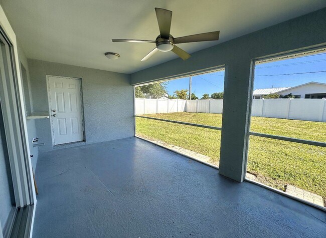 Photo - Stunning 3 Bedroom + Den Home with Fence + Screened Lanai in Great Location!