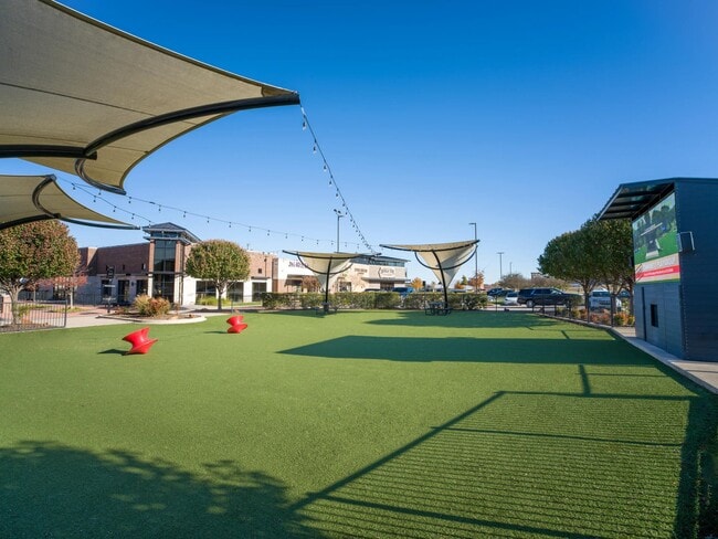 Shaded greenspace at nearby Shops at Willow Park feature open turf and seating offering a relaxed place to spend time outdoors close to home.