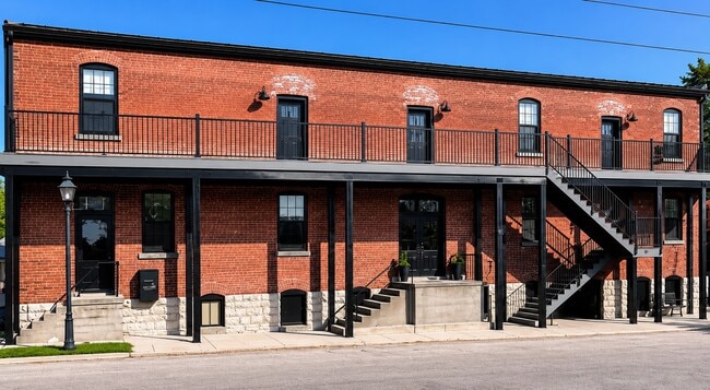 Exterior of Building: The top floor has three apartments and the main floor is a professional space - 101 W Broadway St Unit C