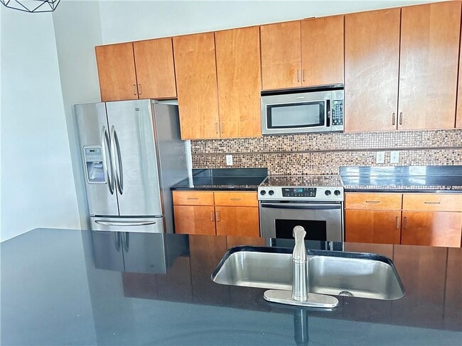 Photo - 711 Cosmopolitan Dr NE Unit 145