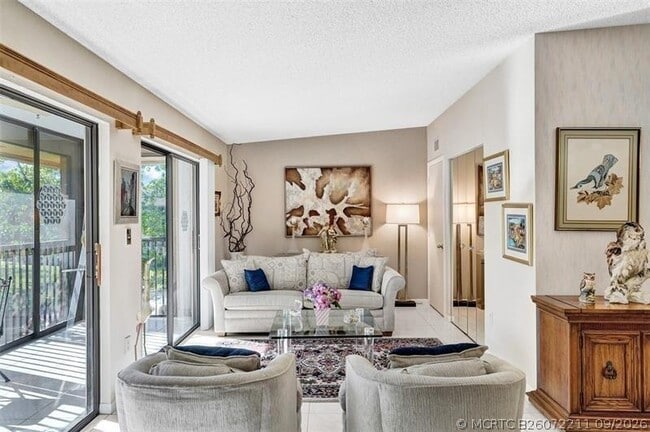 Building Photo - 10783 W Clairmont Cir Unit 205
