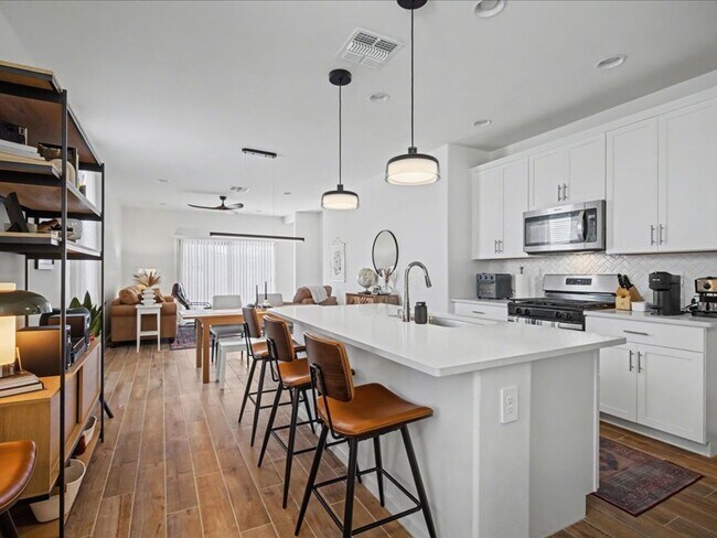 Photo - Spacious 4-Bedroom Home with Modern Features & EV Charging!
