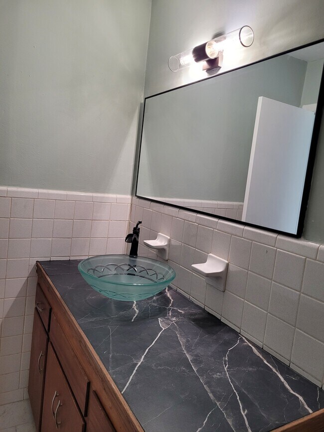 Bathroom with Porcelain Counter