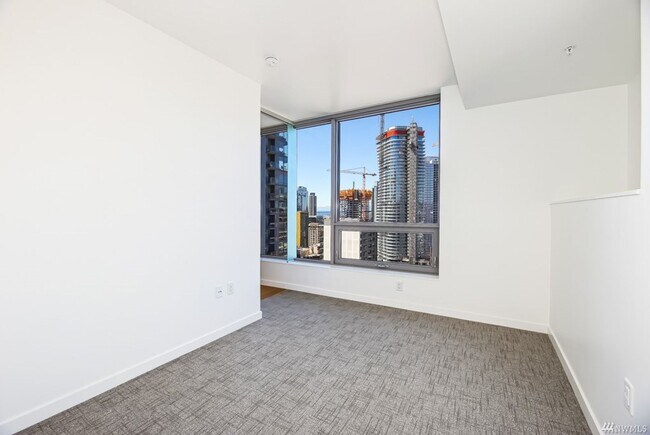 Photo - Spacious NW-Facing 1 Bed + Den, 1 Bath Luxury High-Rise Condo in Seattle's Denny Triangle – Nexus