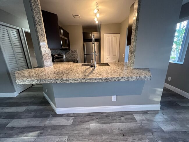 Building Photo - 3429 NW 44th St Unit 203