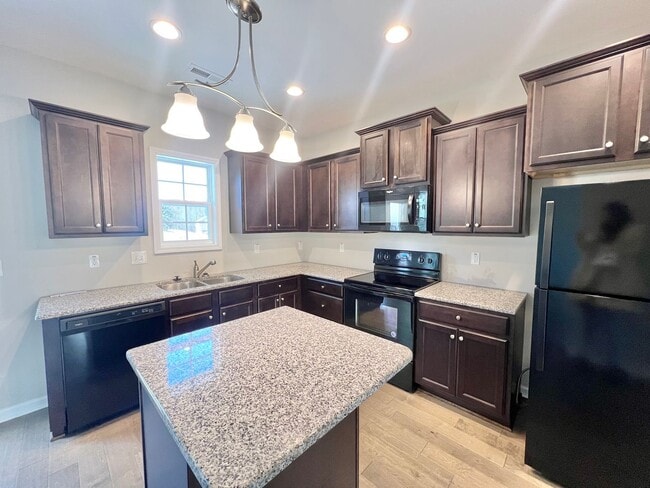 Photo - Lovely 4BD, 2.5BA Clayton Home with 1-Car Garage in a Great Location